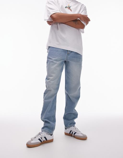 Topman – Schmal zulaufende Jeans in hellblau getönter sommerlicher Waschung