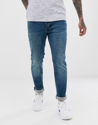Topman – Schmale Stretch-Jeans aus Bio-Baumwollmischung in mittelblauer Waschung