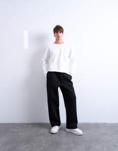 Model wearing Scuba-style fabric jogger in black