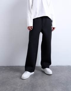 Model wearing Scuba-style fabric jogger in black