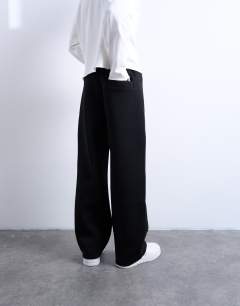 Model wearing Scuba-style fabric jogger in black