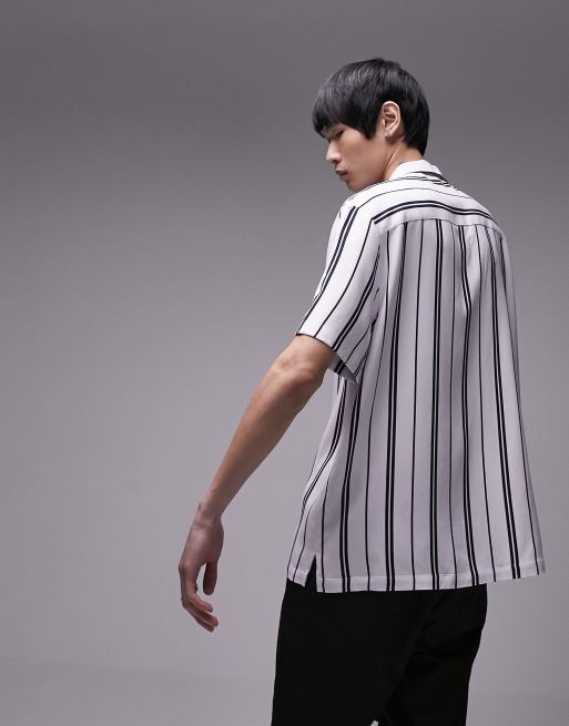 Black and white striped shirt best sale outfit men