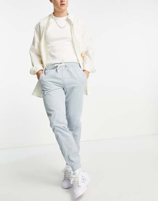 Topman skinny cord jogger trousers in blue