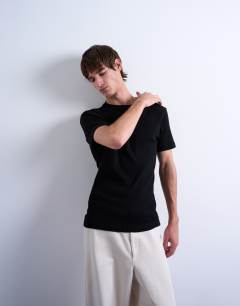 Model wearing Skinny fit ribbed t-shirt in black