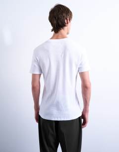 Model wearing Skinny fit ribbed t-shirt in white