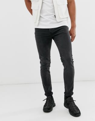 washed black stretch skinny jeans