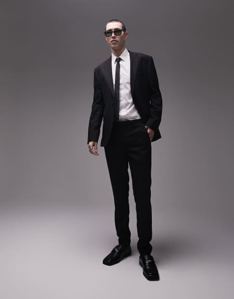 black suit and grey pants