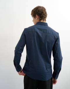 Model wearing Slim fit long sleeve formal stretch shirt in navy