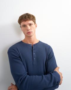 Model wearing Slim fit long sleeve rib henley t-shirt in navy
