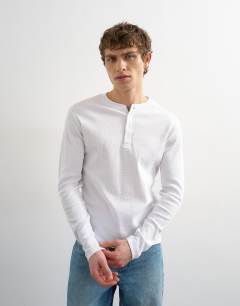 Model wearing Slim fit long sleeve rib henley t-shirt in white