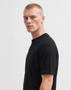 Model wearing Slim fit rib henley t-shirt in black