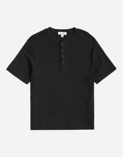 Model wearing Slim fit rib henley t-shirt in black