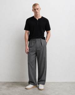 Model wearing Slim fit rib henley t-shirt in black