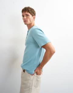 Model wearing Slim fit rib henley t-shirt in light blue