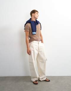 Model wearing Slim fit rib henley t-shirt in light brown