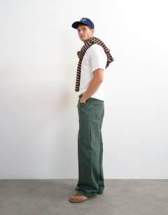 Model wearing Slim fit rib henley t-shirt in white