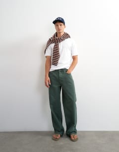 Model wearing Slim fit rib henley t-shirt in white