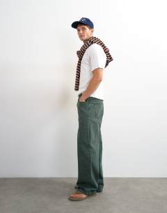 Model wearing Slim fit rib henley t-shirt in white