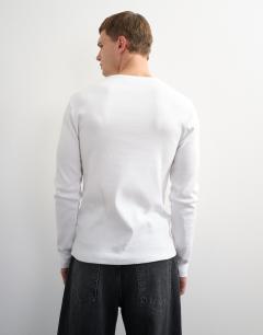 Model wearing Slim fit rib long sleeve t-shirt in white