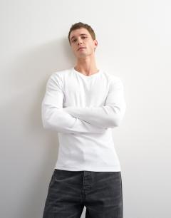 Model wearing Slim fit rib long sleeve t-shirt in white