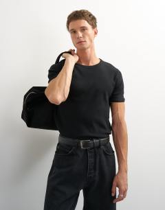 Model wearing Slim fit rib t-shirt in black