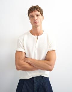 Model wearing Slim fit short sleeve waffle henley in ecru