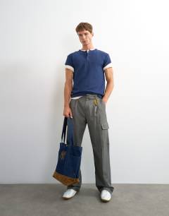 Model wearing Slim fit short sleeve waffle henley in navy