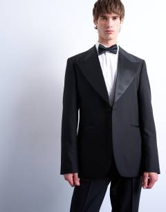 Model wearing Slim tux suit jacket in black