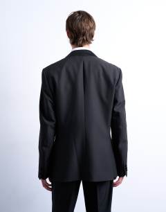 Model wearing Slim tux suit jacket in black