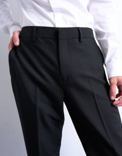 Model wearing Slim tux suit trousers in black