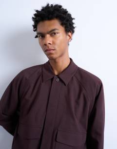 Model wearing Smart harrington jacket in burgundy