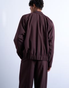 Model wearing Smart harrington jacket in burgundy