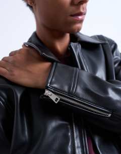 Model wearing Soft faux leather jacket in black