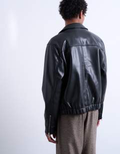 Model wearing Soft faux leather jacket in black