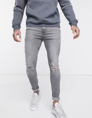 spray on grey jeans