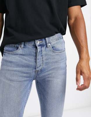 light blue spray on jeans
