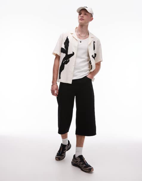 Topman – Średniej długości szerokie szorty jeansowe w spranym czarnym kolorze - view 1