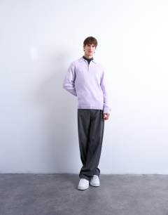 Model wearing Standard fit zip polo in lilac