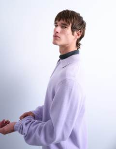 Model wearing Standard fit zip polo in lilac