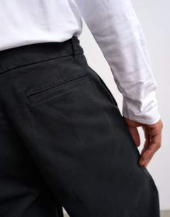 Model wearing Straight chino in black