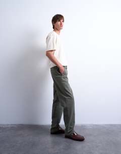 Model wearing Straight fit herringbone trouser in khaki