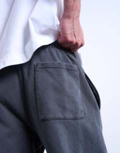Model wearing Straight fit jogger with seam detail in washed black