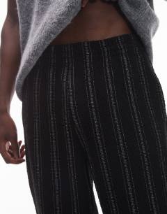 Model wearing Straight fit jogger with textured stripe in black