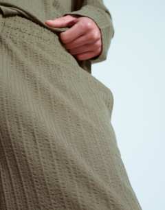 Model wearing Straight fit seersucker jogger in khaki