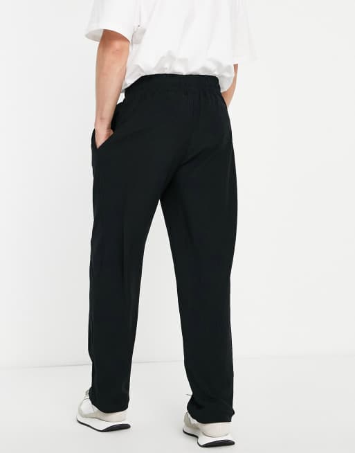 Topman straight leg corduroy joggers in black ASOS