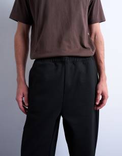 Model wearing Straight leg interlock jogger in black