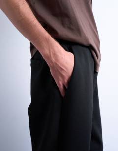 Model wearing Straight leg interlock jogger in black