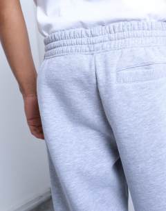 Model wearing Straight leg jogger in grey marl