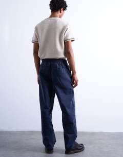 Model wearing Straight leg twill elasticated waist trouser in navy