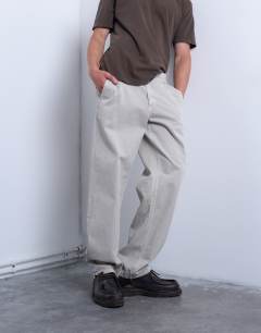 Model wearing Straight leg twill elasticated waist trouser in stone
